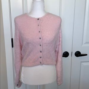 Free People pink fuzzy sweater.